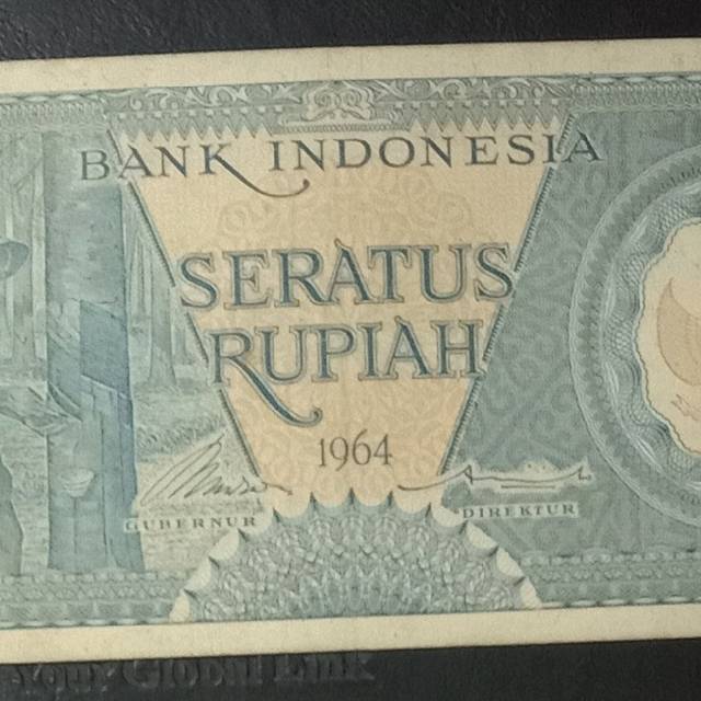 Uang kuno Indonesia seri pekerja tangan II 100 rupiah biru tahun 1964