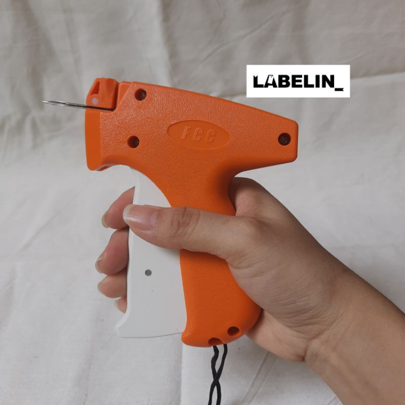 

HJK PAKET KOMPLIT Tag Gun + Tag pin (alat tembak baju pakaian topi syal selimut kaos kaki aksesoris