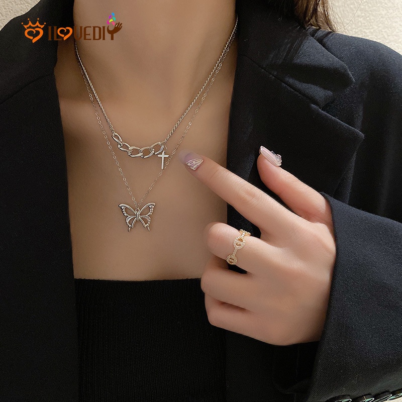 Kalung Multilayer Liontin Butterfly Cross Bahan Metal Gaya Vintage Hip Hop Untuk Wanita