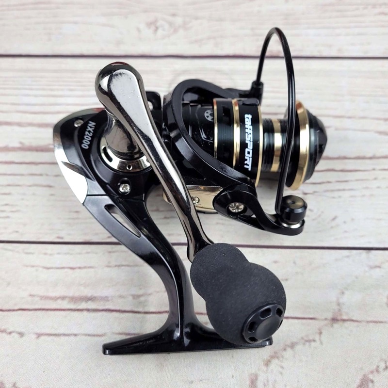 TaffSPORT Gold Sharking NX 2000 NX4000 NX 6000 Series Metal Reel Pancing Fishing Reel 5.2:1 Gear Ratio Drag Power 12Kg - Black