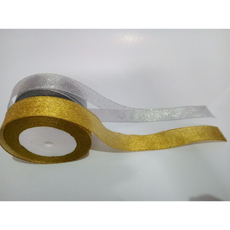 

Pita Glitter emas dan perak (gold & silver) ukuran 1inchi/2,5cm dijual per meter