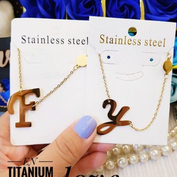 Titanium kalung huruf