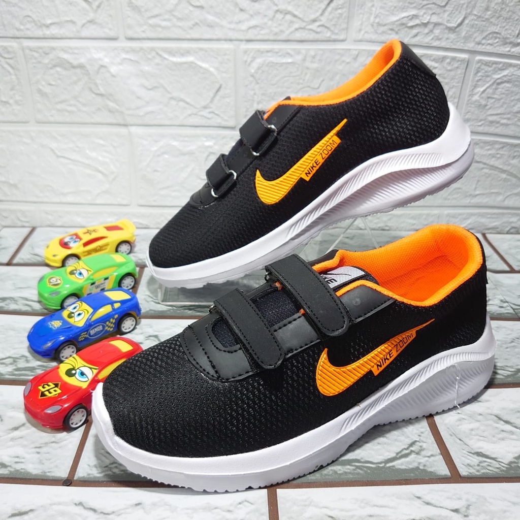 Sepatu Sneakers Sepatu Anak Import zoom Size hitam oranye perekat 26-37 Usia 4-10 Tahun
