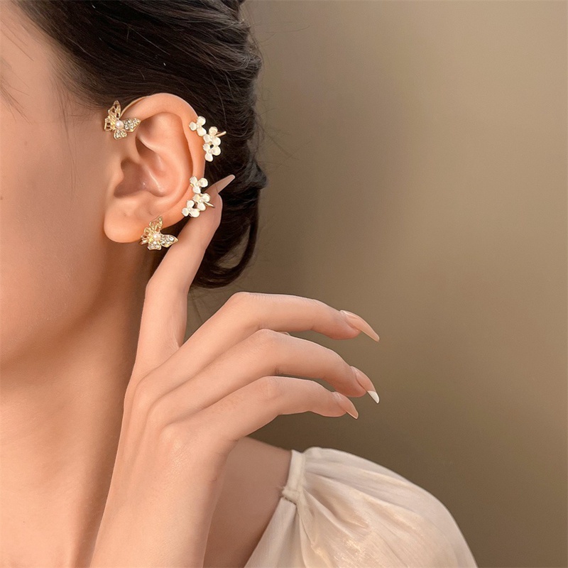 1pc Anting Klip Telinga Kiri Tanpa Tindik Desain Kupu-Kupu Putih Bunga Mutiara Berlian Imitasi Untuk Wanita
