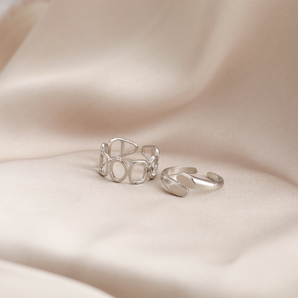 2pcs / Set Cincin Model Terbuka Bahan Metal Desain Geometri Hollow Warna Silver Gaya Simple / Trendy Adjustable Untuk Wanita