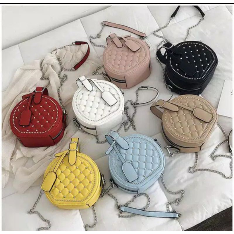 tas import bulat selempang