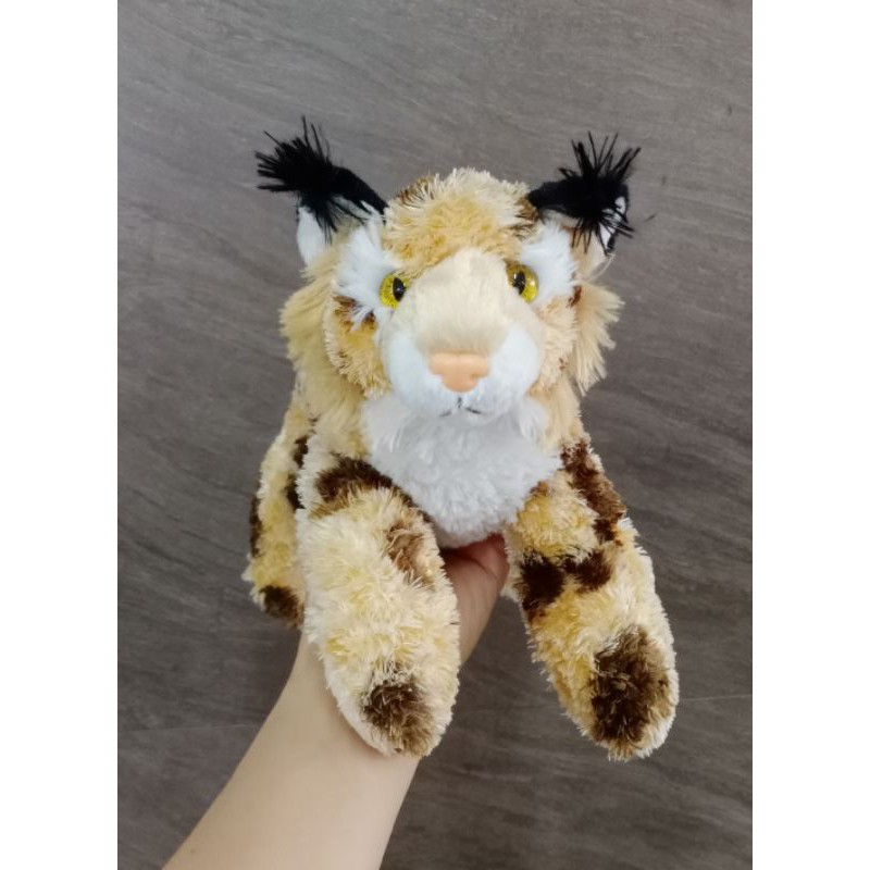 Boneka Kucing Hutan Lying