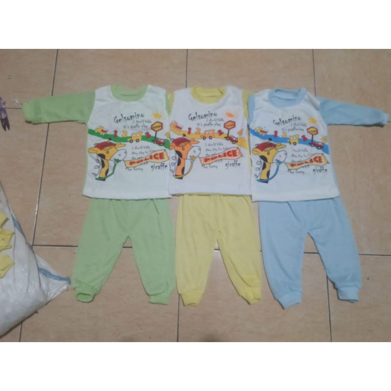 1 lusin setelan baju anak