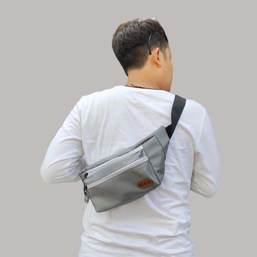 Tas Selempang Pria Laki-laki Cowok Casual Kasual Distro Terbaru untuk Jalan-jalan Traveling Bahan Synthetic Leather / Tas WaistBag SlingBag Pria warna Abu-abu Murah dan Keren