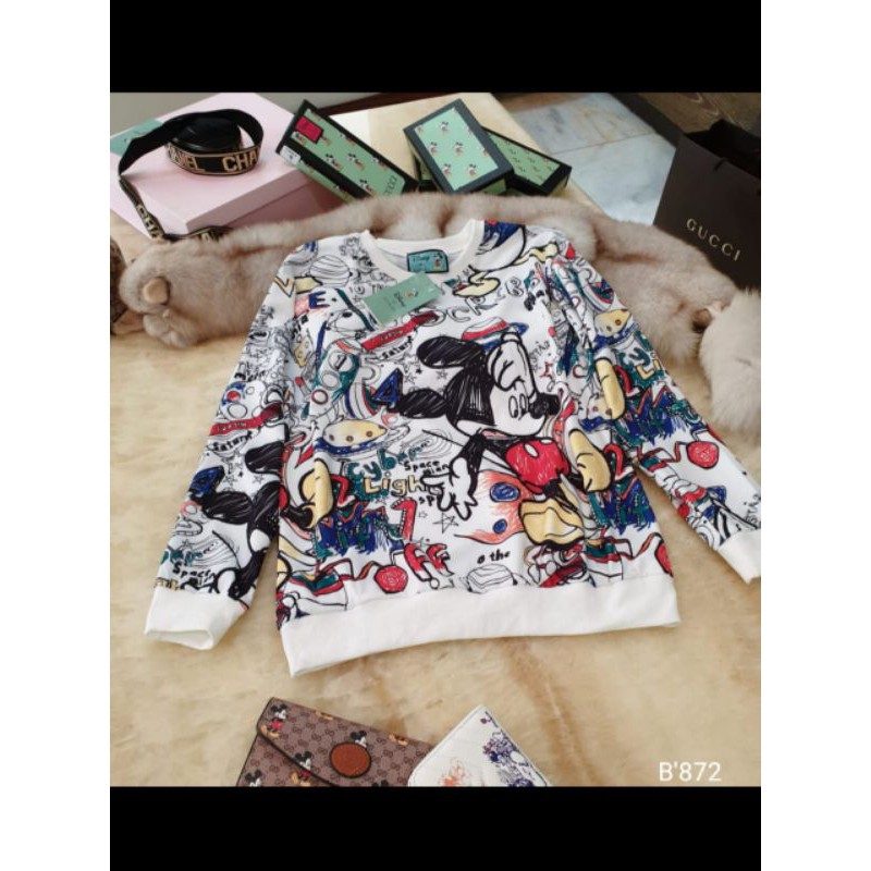 

Sweater Gu**ci mickey ada tag dan label