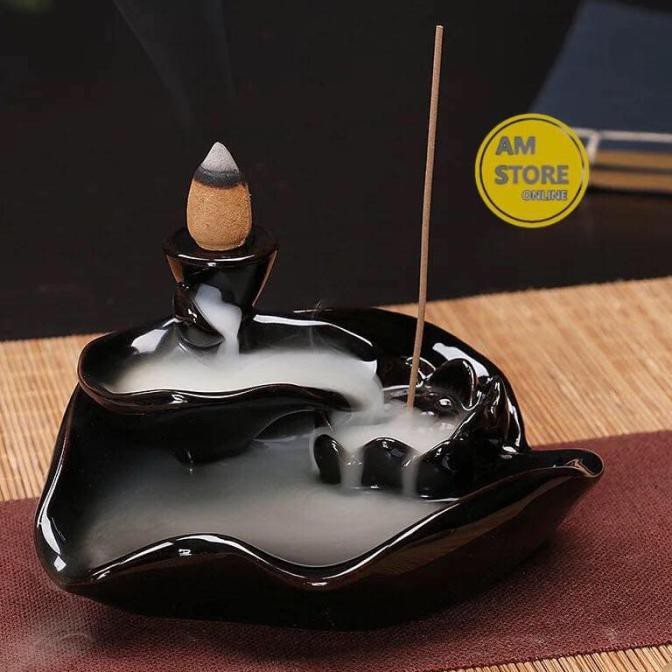 Tempat bakar dupa asap hiolo air terjun - Maroon