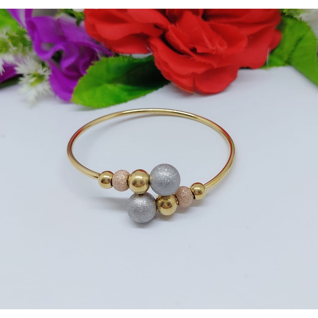 Titanium gelang dan cincin biji bola A.B