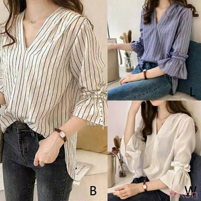 Atasan Wanita Flare Model Longgar Motif Garis d