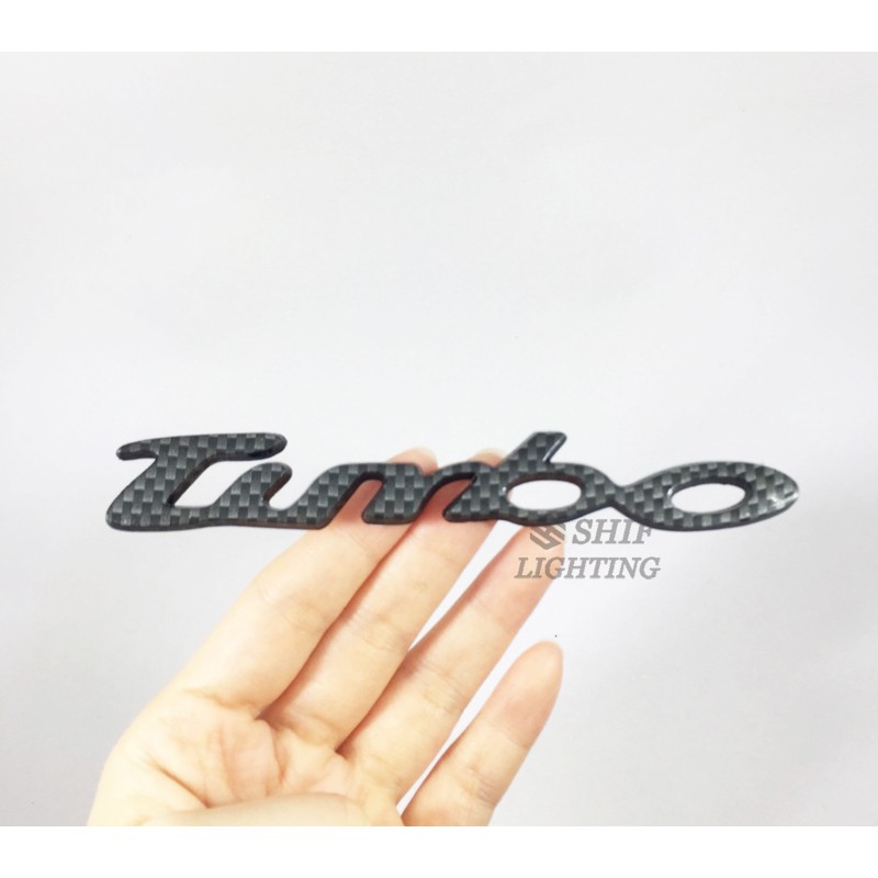 1pc Stiker Emblem / Badge Logo Turbo Bahan Karbon Fiber Untuk Samping / Belakang Mobil Mitsubishi