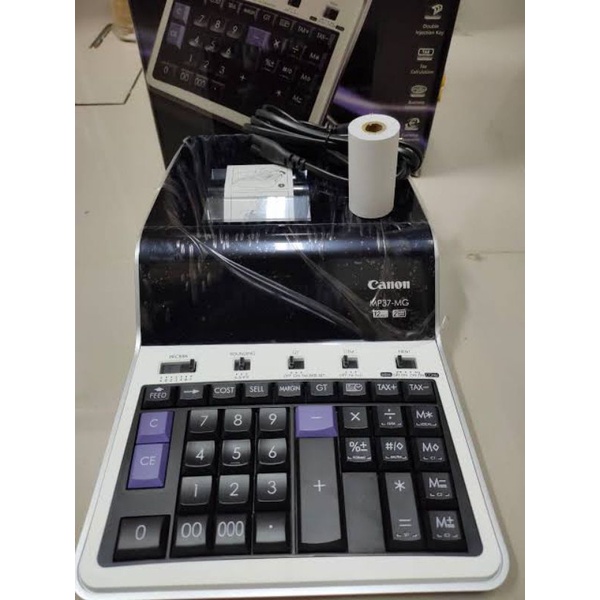 

CANON KALKULATOR PRINT MP 37 MG 12 DIGIT PRINTING CALCULATOR