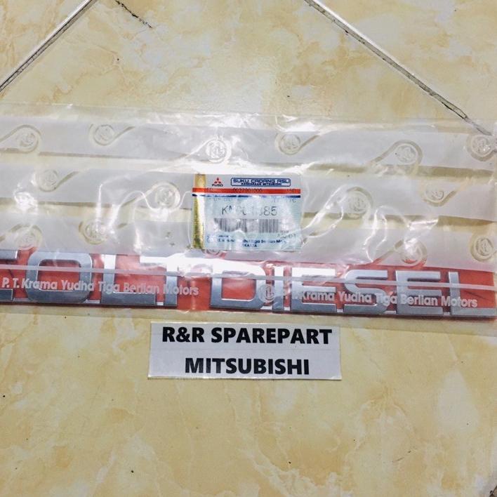 Baru EMBLEM COLT DIESEL / LOGO COLT DIESEL  ORIGINAL 100% MITSUBISHI KM004885 