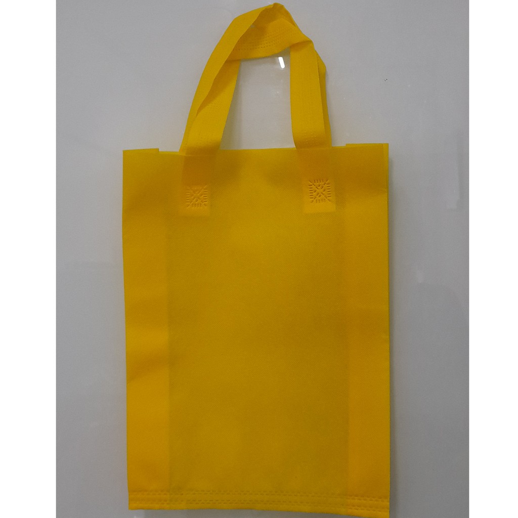 

(Lusin) Tas Press Spunbound Tali Goodie Bag Tas Belanja Warna Kuning 30 cm x 40 cm