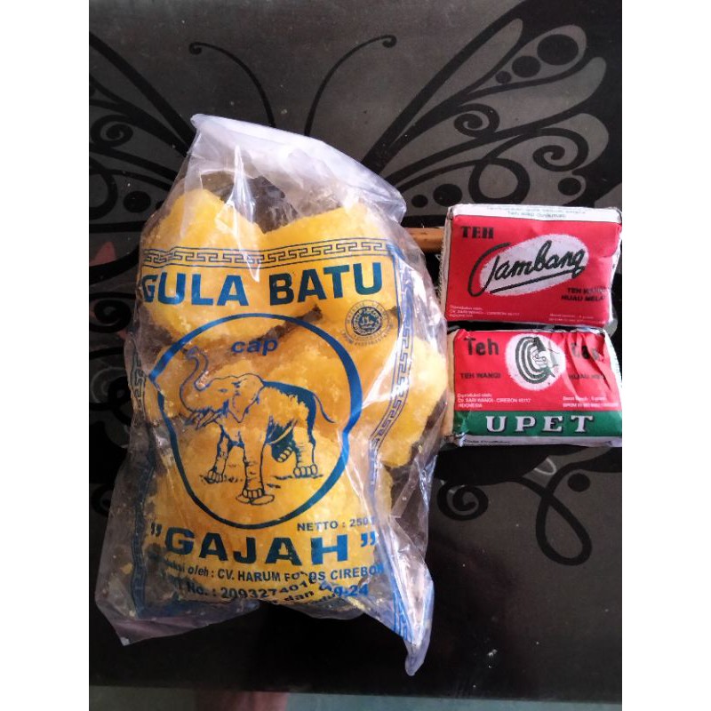 

Gula Batu Kuning - Cap Gajah - Khas Cirebon Kemasan 1/4kg