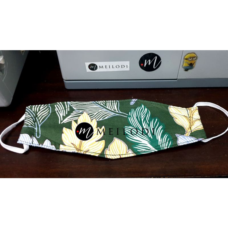 masker kain model kf94 motif daun hijau