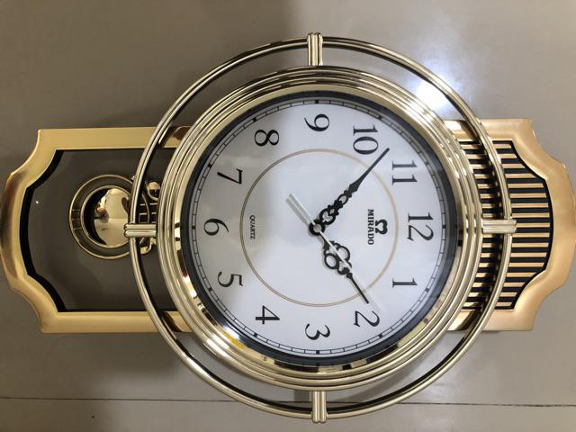 Jam Dinding Mirado Musik Bandul Goyang 937 Diameter 33cm