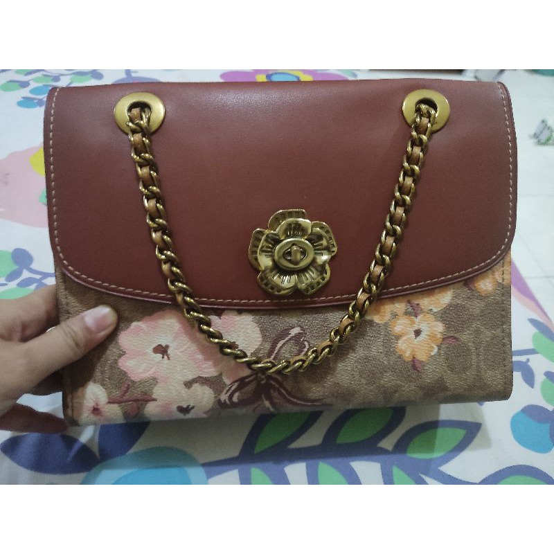 Preloved tas Coach parker signature Prairie flower