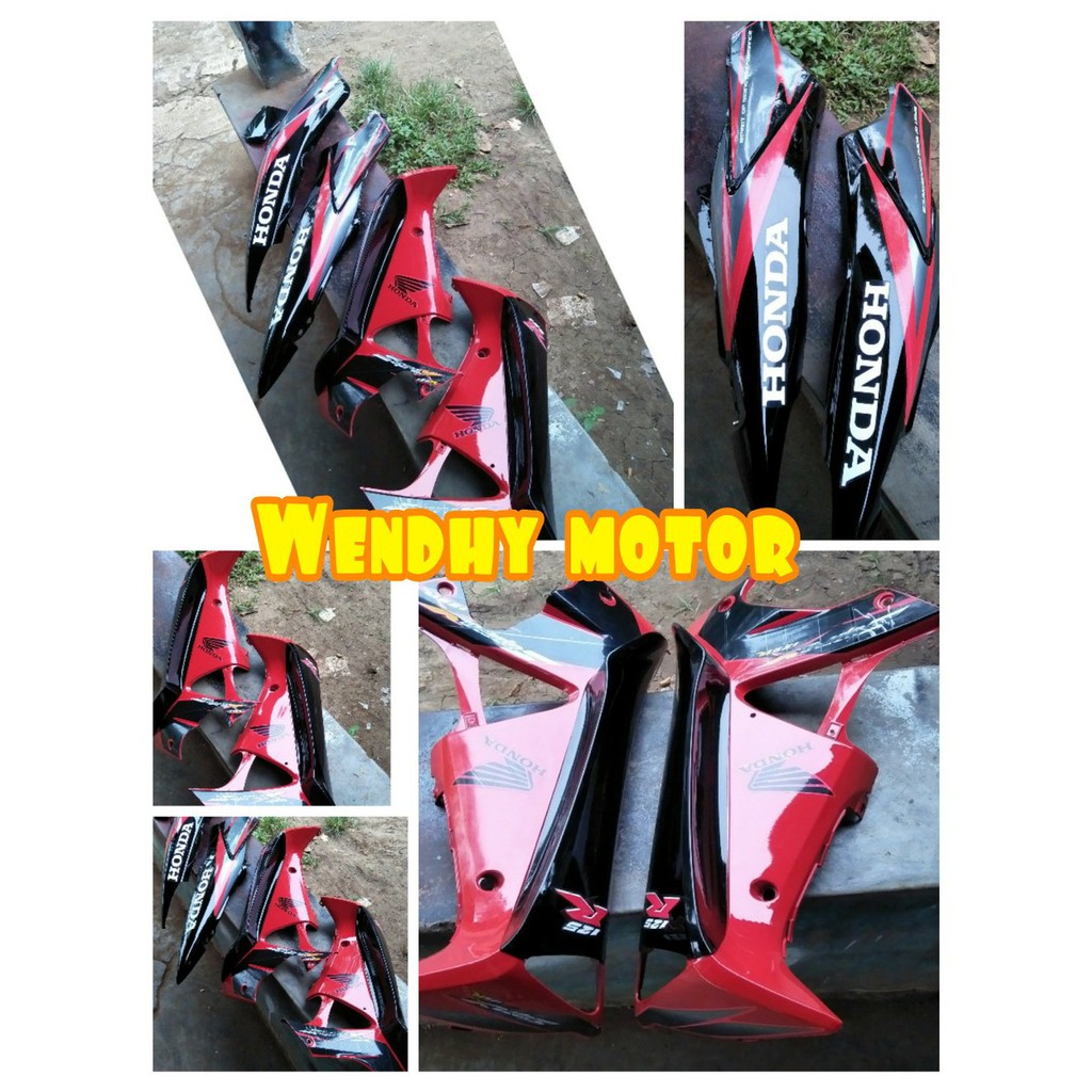 bodi   sayap supra x 125 merah hitam