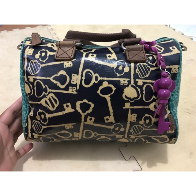 Fossil keyper skeleton satchel