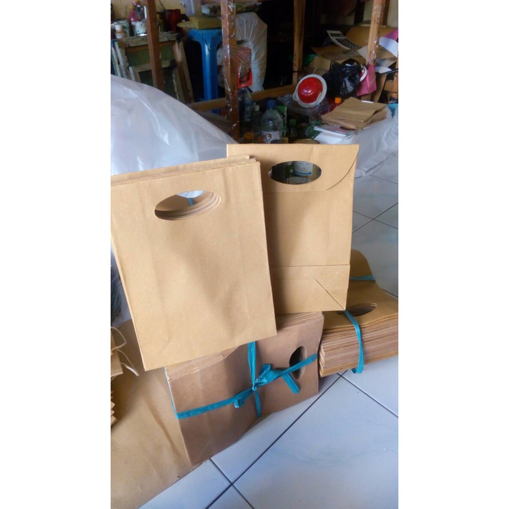 

Tas amplop coklat sablon dgn pons ukuran P20xL8xT22