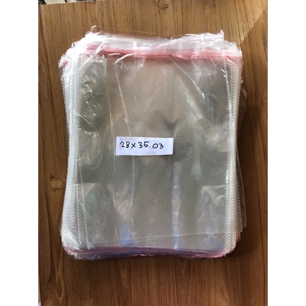 Plastik Bening OPP 03 ukuran 28x35 Untuk Kemasan Baju