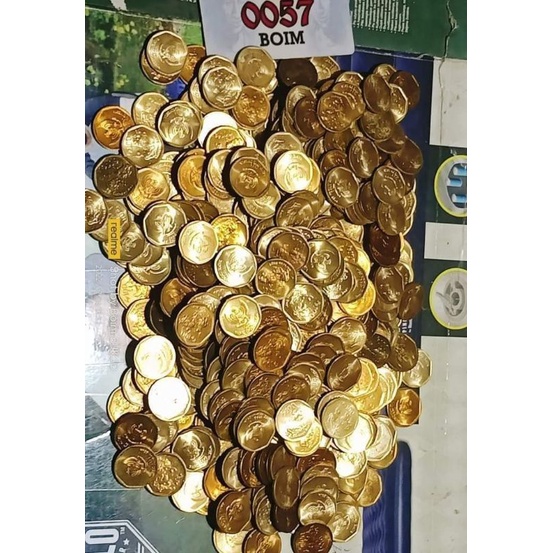 koin 100 rupiah karapan sapi