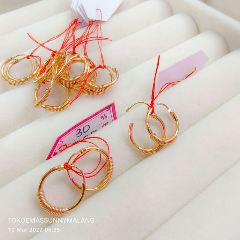 Anting tindik bayi 300%