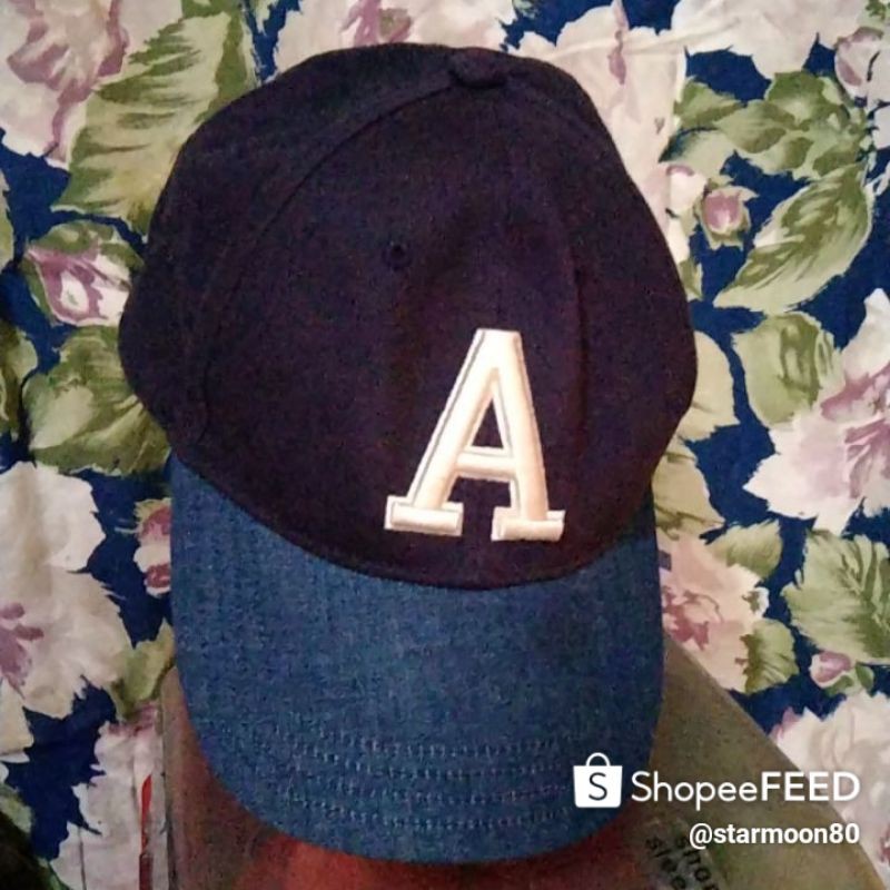 Topi Inisial A. Bahan Navy Blue jeans.