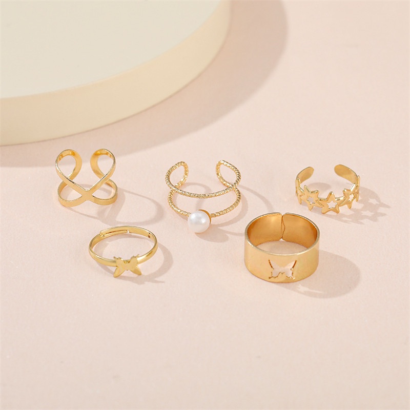 5pcs / Set Cincin Desain Kupu-Kupu Hollow Cross Aksen Mutiara Untuk Wanita