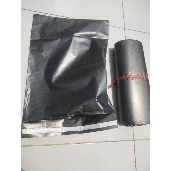 

Plastik Packing Polymailer 30x40 plastik packing HD Warna Hitam - Lem Perekat