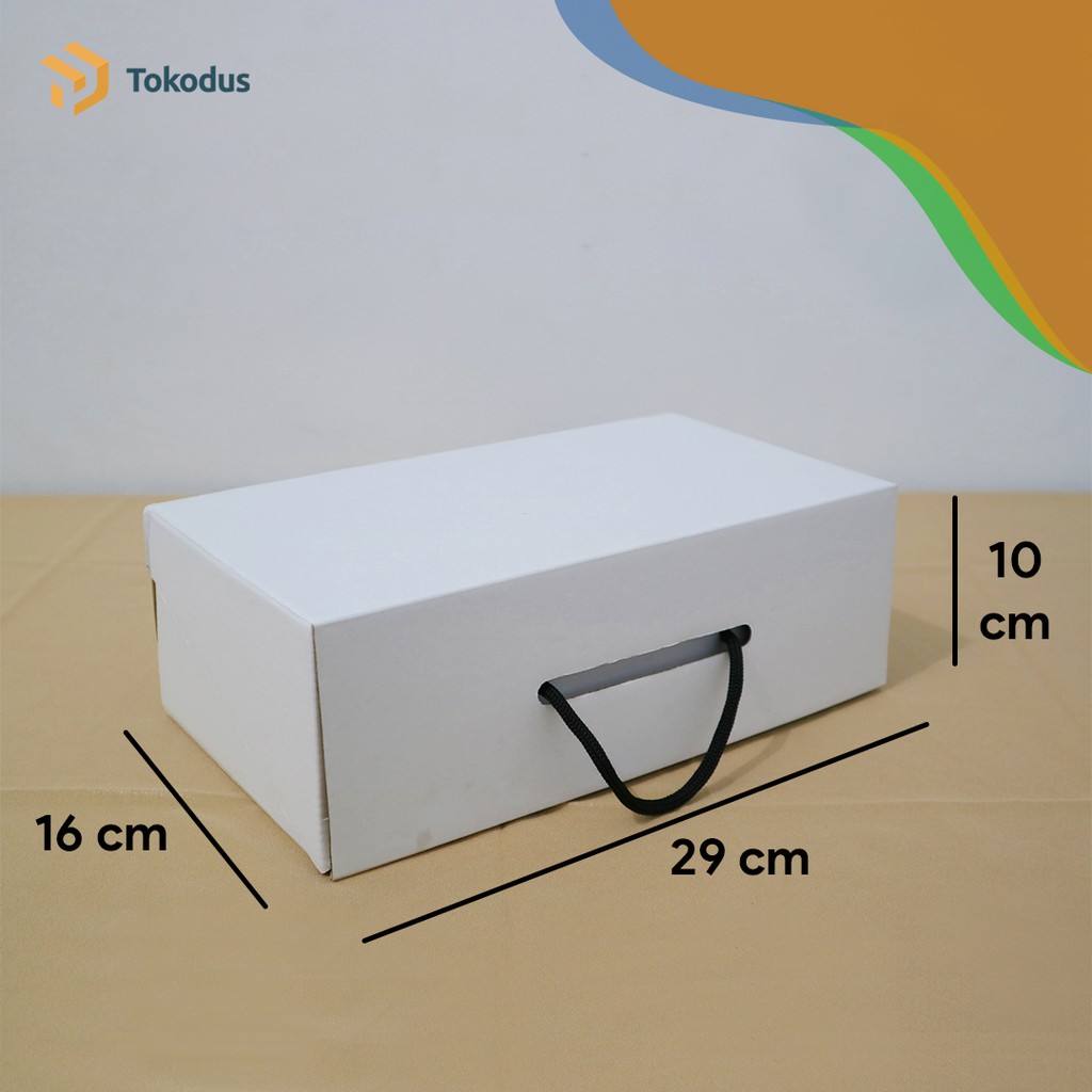 

Kardus Sepatu Duplex 29x16x10 cm Dus Box Sepatu Model Tali - Tokodus Bandung