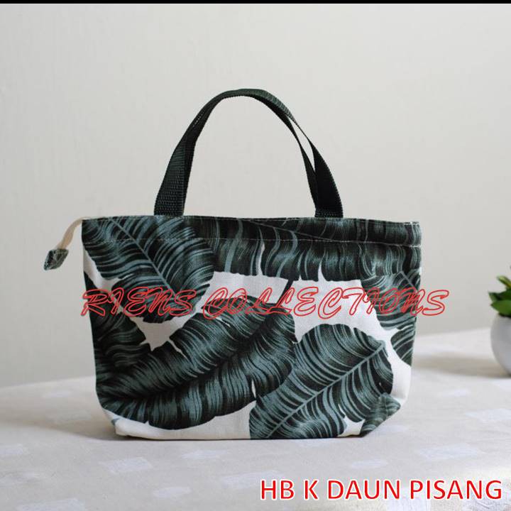 RIENS COLLECTIONS. HANDBAG KECIL BAHAN KANVAS MOTIF DAUN PISANG. TAS KANVAS