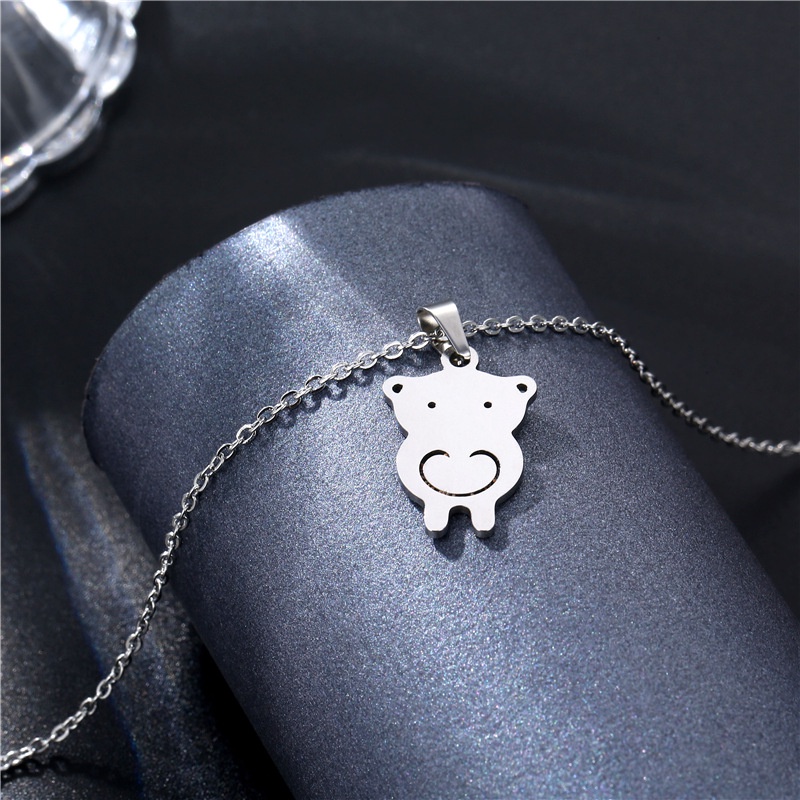 304L stainless steel piggy kalung Eropa dan Amerika populer hollow titanium steel lucu gadis lucu ba