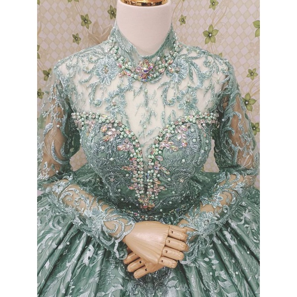 Gaun pengantin hijau wardah