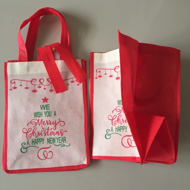 

Tas bingkisan serba guna edisi natal (uk 17x17 tinggi 24 cm)