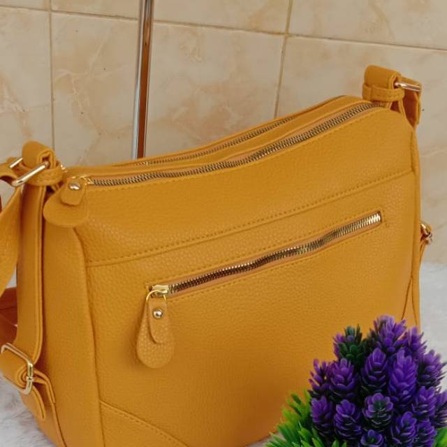 Tas slempang garut kw.