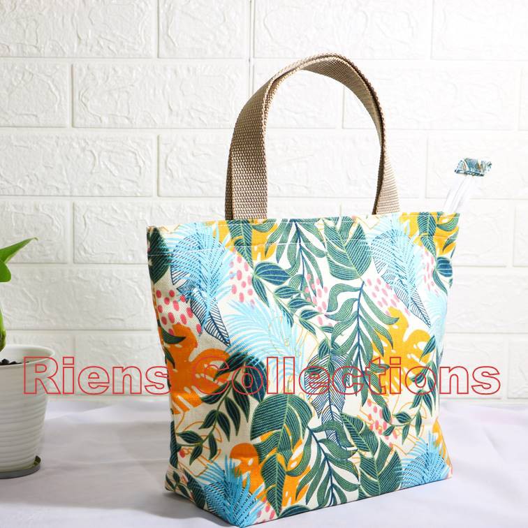 RIENS COLLECTIONS. HANDBAG BESAR BAHAN KANVAS MOTIF FLORAL KUNING