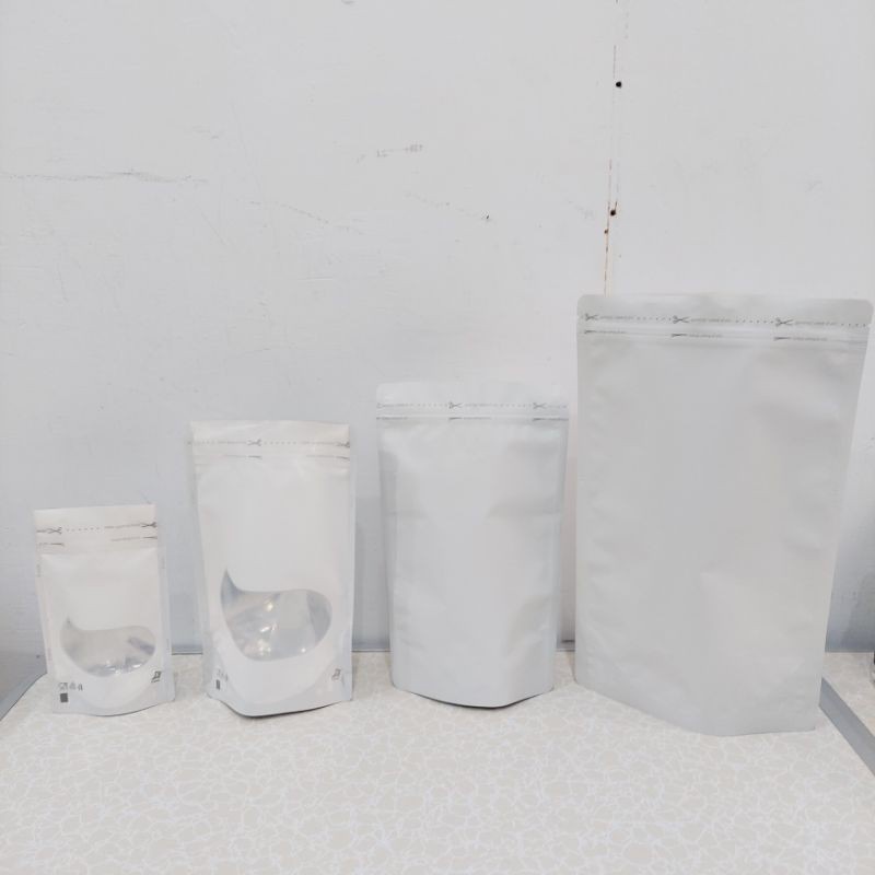 (1PACK ISI 100)KEMASAN STANDING POUCH WINDOW WARNA PUTIH-  K-PACK -STANDING POUCH ALUMUNIUM FOIL