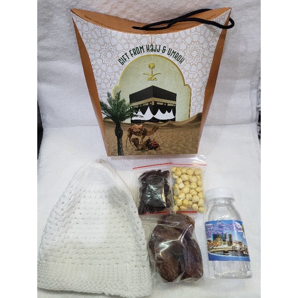 

paket hemat oleh oleh umroh dan haji / peci rajut all size / premium kualitas harga bersahabat / grosir paket murah,kurma,kacang,kismis,ait zamzam,dus tali 15x11cm