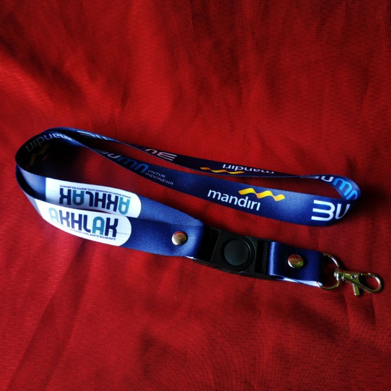 

Lanyard BANK MANDIRI AKHLAK tali lanyard DISTRO gantungan kunci name tag id card kartu nama / tali lanyard gantungan leher