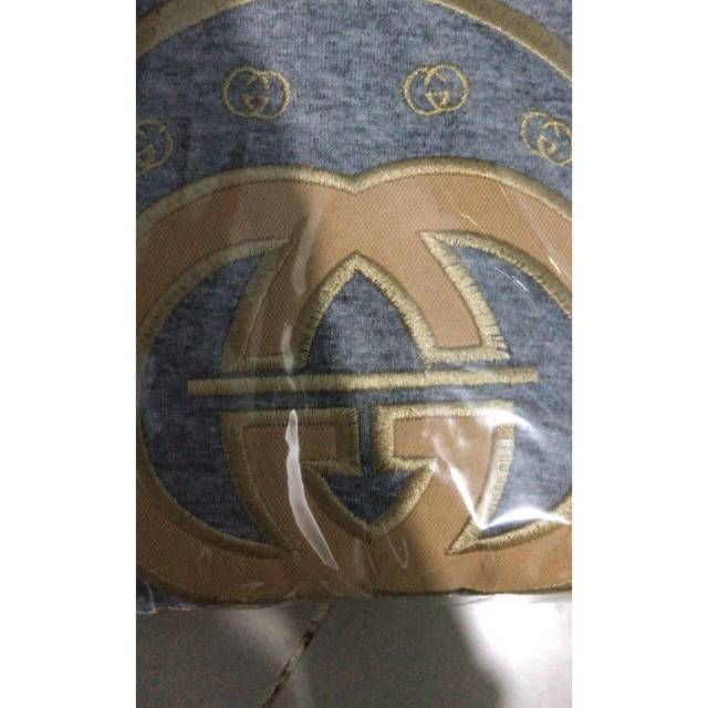 Baju tidur Gucci