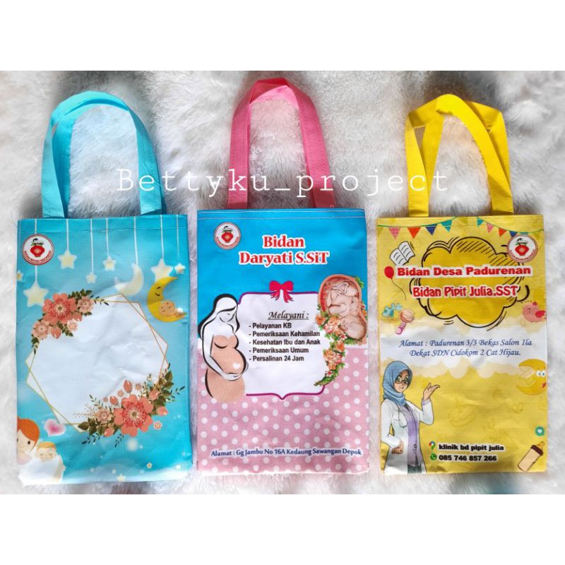 

TAS SOUVENIR BIDAN- TAS BUKU KIA - TAS BIDAN - TAS PARTUS - TAS SOUVENIR CUSTOM NAMA