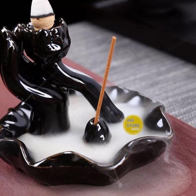 Tempat bakar dupa asap hiolo air terjun tangan