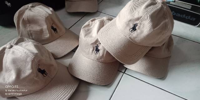 Topi polo bordir cream