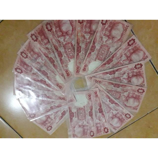 Uang kuno 100 badak  asli