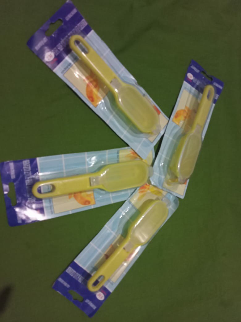 Pembersih Sisik Ikan